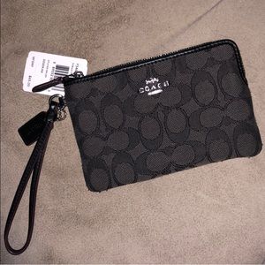 Coach wallet wristlet with coach logo all over. brand new with tags 💕